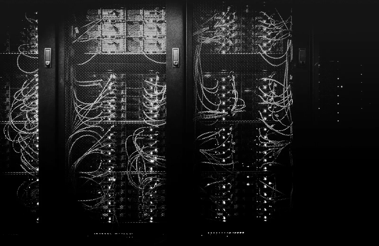 Rows of server racks in a data center